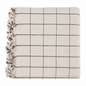 Beige checkered blanket with black lines and tassels on a white background