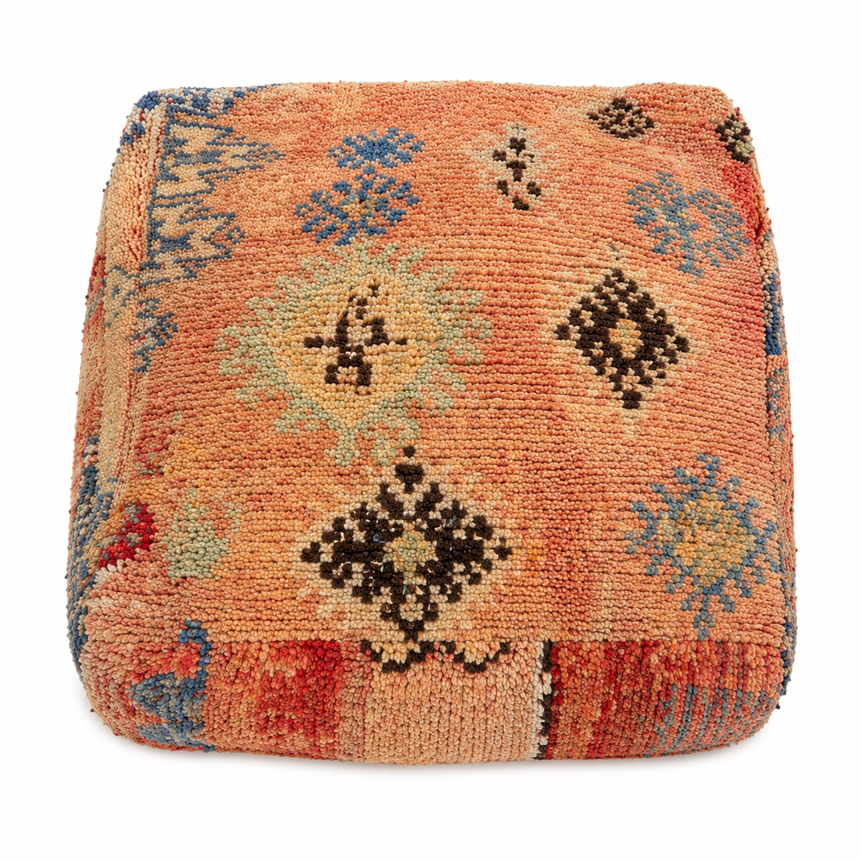 Decorative ottoman with a patterned design on a white background