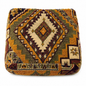 Decorative pillow with geometric pattern on a white background