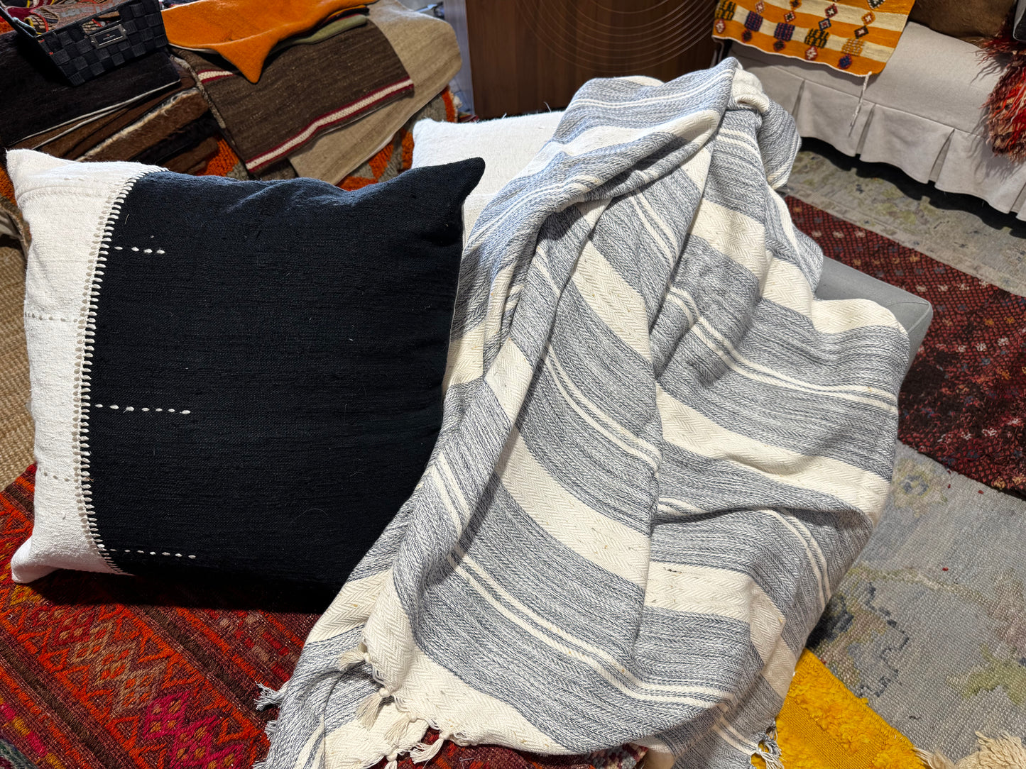 Thick striped blanket on a textured surface