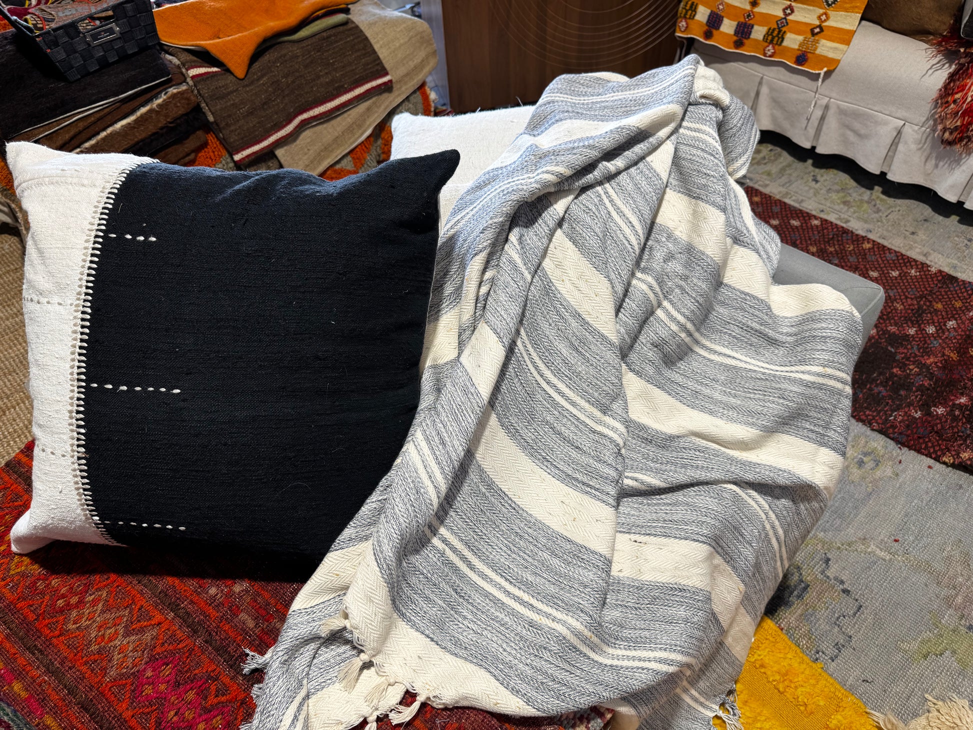 Thick striped blanket on a textured surface